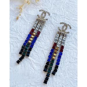 SOLD Chanel 2019 Egyptian silver rainbow drop cc strass tassel earrings